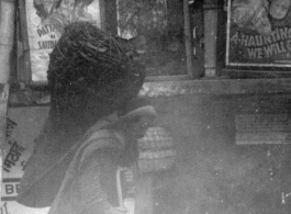 A man carries a heavy load in a giant basket in India.  Local images provided to Ex-CBI Roundup by "P. Noel" showing local people and scenes around Mussoorie, India.   In the CBI during WWII.