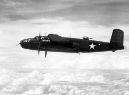 Photograph of B-25C in flight in the CBI, tail number 130367 (serial number 41-30367). Notice the machine gun (.50 cal.) barrel sticking out of the belly of '367.'  This 491st Bomb Squadron aircraft was damaged by flak on 20 Dec 1943 and the crew bailed out. 2nd Lt. Charles H. Redd, navigator, became a POW. He survived and returned to the USA in Sep/Oct 1945.