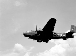 B-25 Mitchell bomber, tail number #426, takes off from an airstrip, possibly Yangkai (Yangjie) air strip in Yunnan province, China.