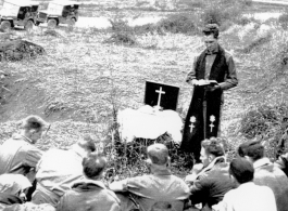 Retreat during Ichigo: "This is Captain Kelley our group chaplain holding roadside services for a group of G.I.'s during the evacuation of our base at Kwelin (Guilin) China."