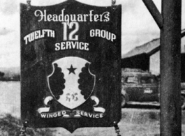 "Another Example Of Joe Goodman's Work. The 12th Air Service Group Emblem In Front Of Headquarters Building,Yang Tong Air Force Base, Kwelin (Guilin), China, 1944."