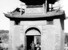 An American GI poses in a gateway at Yunnanyi, China, during WWII, in 1944.