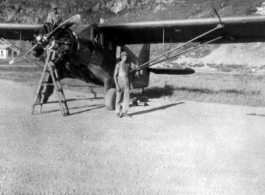 American mechanics work on C-64 at a base in Guangxi, during WWII.