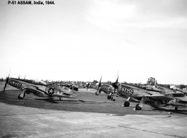 Numerous P-51s lined at Assam, India, 1944, including serials #473932, and #415582.