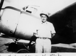 Capt. Lawrence V. Blade poses before an airplane during WWII.   From the collection of David Firman, 61st Air Service Group.