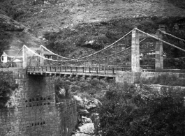 A suspension bridge in SW China during WWII.