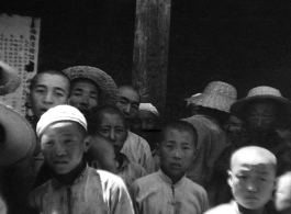 People in northern China pose at a transport company facility in northern China during WWII.