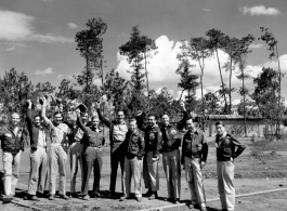 GIs cheer at the hostel area at Yangkai air base during WWII.