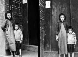 Two elite children from an extremely wealthy family stand in the gate of a elite residence in Yunnan province, that has been appropriated by Nationalist Nationalist 5th Corps forces for military purposes--the white paper posted on the door post says the residence is temporary housing for assistant staff for officers, and HQ for an armored scout unit . The residence compound has its own title, General's Manor (将军第).