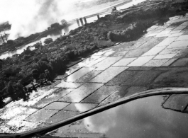 Bombing of Đáp Cầu railway bridge in French Indochina (Vietnam), during WWII. In northern Vietnam, and along a critical rail route used by the Japanese.