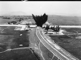 Bombing on a small rail bridge in French Indochina (Vietnam), during WWII.