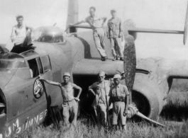 Johnson, Macaluso, Gornick, Lemmon pose with a crashed "Rum Runner" B-25 in Liuzhou June 1944.  William "Wild Bill" Gornick completed his required 200 combat flying hours on "Rum Runner" as it crash landed  following  a  mission against Tien Ho airbase.  Bill assisted the maintenance personnel with salvaging all the useable parts they could until he left for the USA a few days later.