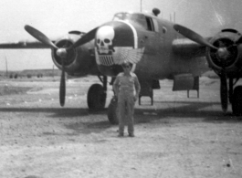 An oversized "Skull & Wings" insignia on plane's side near the nose indicates this parked B-25J Mitchell is assigned to 490th Bomb Squadron, 341st Bomb Group.  The 490th had stayed in India, attached to Tenth Air Force, when 341st BG moved from to China in January 1944. With aerial combat finished in Burma, the 490th BS (attached to 312 Fighter Wing) moved in late April 1945 to Hanzhong (Han-chung), southwestern Shaanxi Province, central China.  (Additional information courtesy of Tony Strotman.)