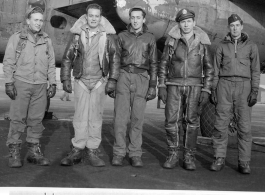 Pilot George Martin and his crew pose before a B-25-D during WWII. L-R: L. Vaughn, E. Biland, E. Daws, and E. Hughes.