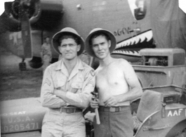 Radar men at Chenggong air base, Yunnan, China. During WWII.  Ira Underwood, Tom Cook.  374th Bombardment Squadron B-24 "Massa's Dragon" #42-109862 in revetment at Chenggong.