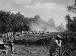 797th Engineer Forestry Company in Burma: Slow moving convoy through construction on the Burma Road.  During WWII.