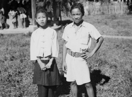 Kachin boy and girl in Burma.  Near the 797th Engineer Forestry Company.  During WWII.