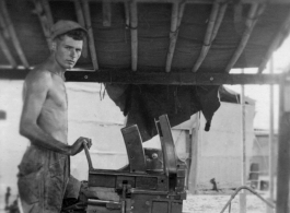 Men of the 2005th Ordnance Maintenance Company,  28th Air Depot Group, working on a gun in Burma. During WWII.