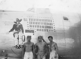 Flyers pose with B-24J bomber "Cactus Kid," serial #44-40857. 10th Air Force, 7th Bombardment Group, 9th Bombardment Squadron.  Walter Wegner on far left.  During WWII.