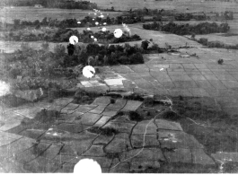 Dropping parachuted incendiaries at Chiang Mai, Thailand, air base.  22nd Bombardment Squadron.