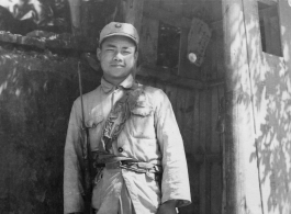 Chinese guard and guard shack, at Kunming, Yunnan, China. During WWII.