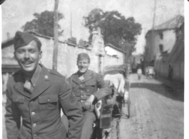 Radar mechanics Jack Leonard and Charles Klaes play with rickshaw in Kunming, Yunnan, China. During WWII.