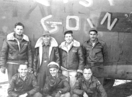 Crew poses with F-7 "Easy Goin'" during WWII.