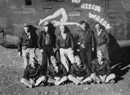 Crew of nine flyers stands before F-7A "My Assam Wagon," #42-64170.  24th Combat Mapping Squadron, 8th Photo Reconnaissance Group, 10th Air Force.