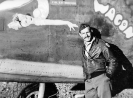 Flyer stands before F-7A/B-24 "My Assam Wagon."  24th Combat Mapping Squadron, 8th Photo Reconnaissance Group, 10th Air Force.