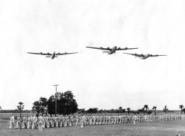 Medal presentation ceremony with B-24/F-7 flyover on February 17, 1945, in Gushkara, India.