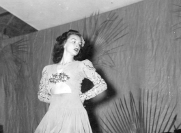 Dancing at a USO show in Gushkara, India, during WWII.  The boxes in front of the band players are labeled 748th ROB (748th Railway Operating Battalion).