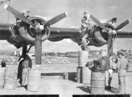 Engine maintenance F-7A/B-24 "The FLYING ANVIL." At Chanyi (Zhanyi), China.  24th Combat Mapping Squadron, 8th Photo Reconnaissance Group, 10th Air Force.