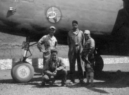 Pete Bertani, Peterson, Frank Bates, unknown, posing before a B-25 Mitchell in a revetment in China, likely Yangkai.