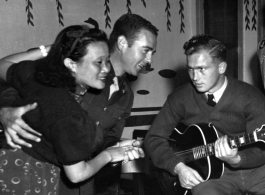 Alice Chong and Captain Addison Bailey dance while another GI plays guitar.  (Images and information primarily courtesy of Brian Dillon.)