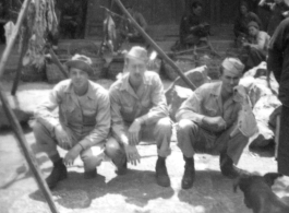 GIs in a market in Luliang, China, during WWII. Soldier in the middle is "Nelson."  From the collection of David Axelrod.