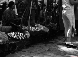 A scene at the Kunming flower market in WWII.