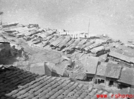 Boats clustered on the Yellow River during WWII, possibly in or near Lanzhou.