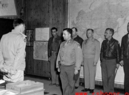 Award for crew of Casey Vincent. During WWII. Clinton D. "Casey" Vincent is the tall one in back, second from the right.  Far left is probably  Lt. Col. Grattan "Grant" Mahony (commander of the 76th Fighter Squadron).