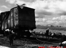 Allied gas train at the edge of the field, Liuzhou (Luichow), China Sept 1944, after a Japanese bombing raid, during WWII.