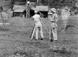 Cameramen film at an American air base in Guangxi province, China, during WWII. This is either Liuzhou base or Guilin base.