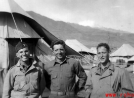 Douglas Runk (center) and two other GIs at an American tent camp on Burma Road in the Xiaguan/Dali area, near the outlet to Erhai Lake. During WWII.