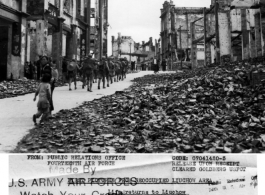 After heavy fighting in the city of Liuchow [Liuzhou], from which the Japanese were driven, civilians return to their damaged city.