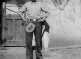 "'Giggles,' our houseboy in Yunnanyi." (Yunnan, China). During WWII.