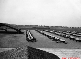 L-5s lined up in rows in India.  From the collection of David Firman, 61st Air Service Group.