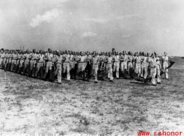 Members of the 61st Air Service Group marching in review on June 21, 1944, at LAAF (Laguna Army Airfield).