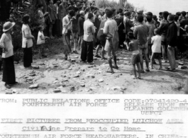 Excited civilians applaud and surround American GIs who have just returned to Liuzhou on the heels of the retreating Japanese upon the failure of the Ichigo Campaign. "From: Public Relations Office Fourteenth Air Force Code 07041420-4 Release On Rcpt Cleared Goldberg USFCT  -FIRST PICTURES FROM REOCCUPIED LIUCHOW AREA-  Civilians Prepare to Go Home Fourteenth Air Force Headquarters, In China--  Civilians gather ready to go back to their ruined city of Luichow, after the Japanese, severely pressed by Chinese