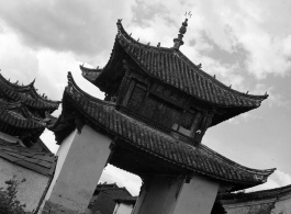 Ornate whitewashed gate at a village in Yunnan, probably Yangkai.  Architecture in Yunnan province, China.