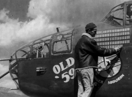 Sgt. William R. Zieman of Chicago, Illinois chalks up the 121st mission on the North American B-25 "Old 59" at an airbase somewhere in China during WWII.  341st Bomb Group, 491st Bomb Squadron.