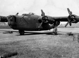 The B-24 "China Clipper" in the CBI, showing damage to one engine.  Selig Seidler was a member of the 16th Combat Camera Unit in the CBI during WWII.