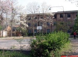 Another area where Lt. Garner might rest. The other area is behind the brick wall on the left of the basketball court.